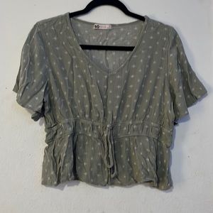 Light green and white womans blouse